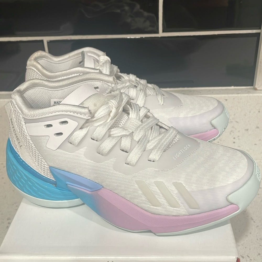 Brand new Mitchell sneakers by Addidas in size 11